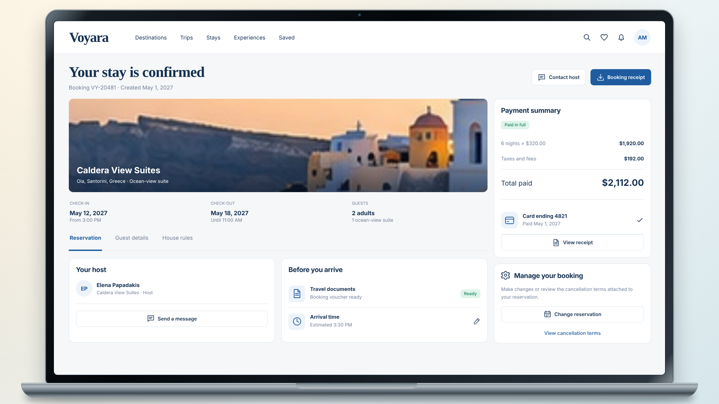 Voyara client project: confirmed booking details shown on a laptop.